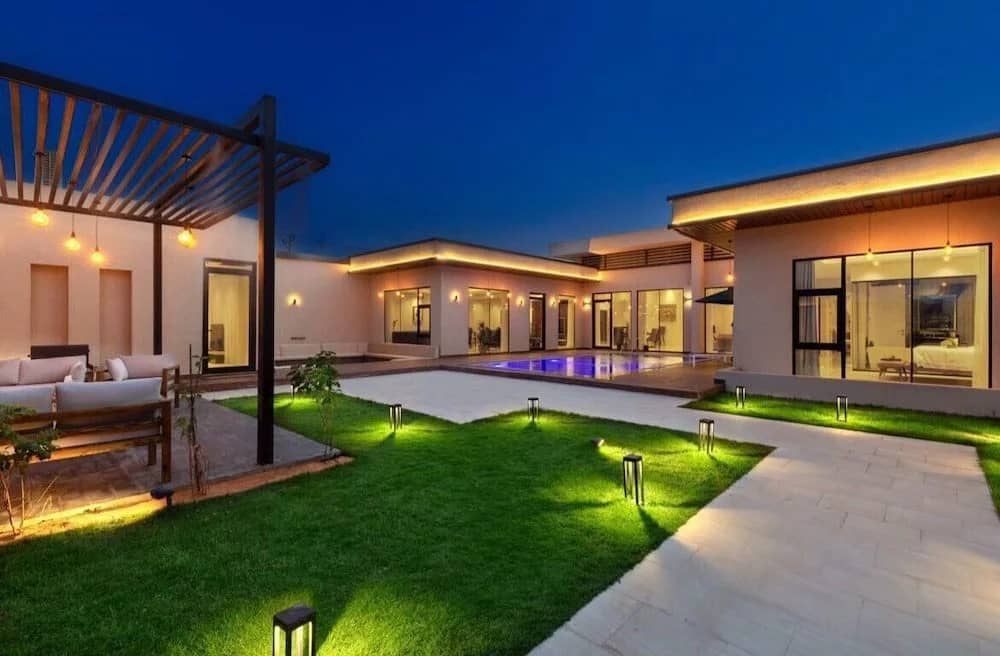 Elegant outdoor area with pool and seating at Suknai Resort Riyadh, Saudi Arabia