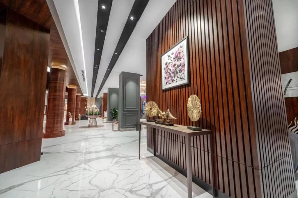 Elegant hallway with art and decor at Sukani Royal Hotel Hail, Saudi Arabia.
