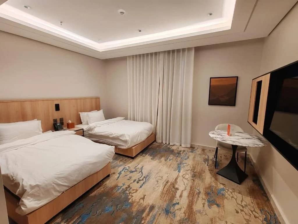 Guest room with twin beds at Ayas Hotel Hail, Hail, Saudi Arabia.