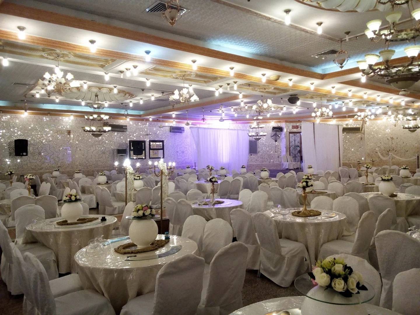 Elegant banquet hall setup at Andalus Palace for Wedding Makkah, Saudi Arabia.
