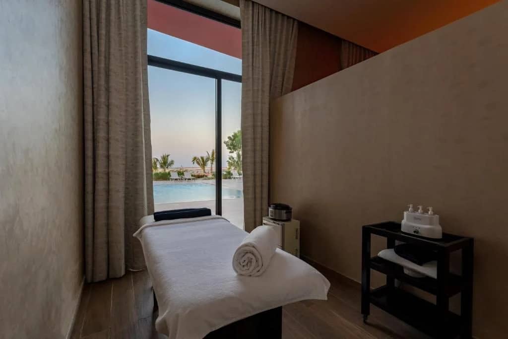 Spa treatment room with pool view at Voco Dubai Nice The Heart of Europe