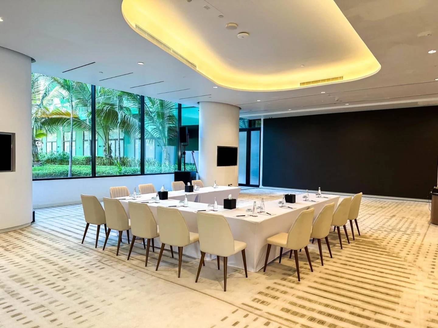 Conference room with large windows at Voco Dubai Nice The Heart of Europe, Dubai.