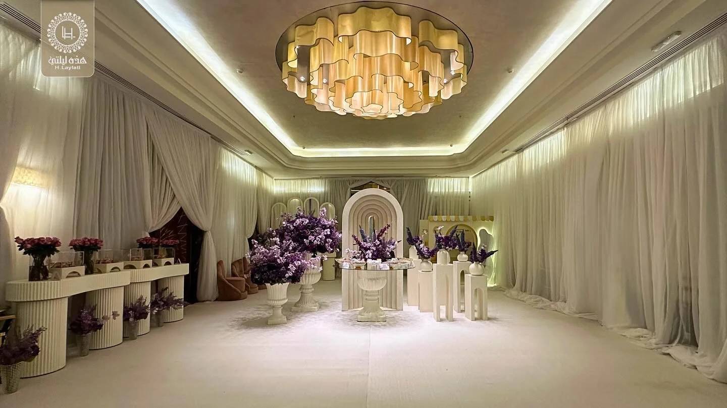 Elegant interior with floral arrangements at H Laylati Event Venue, Madinah, Saudi Arabia.