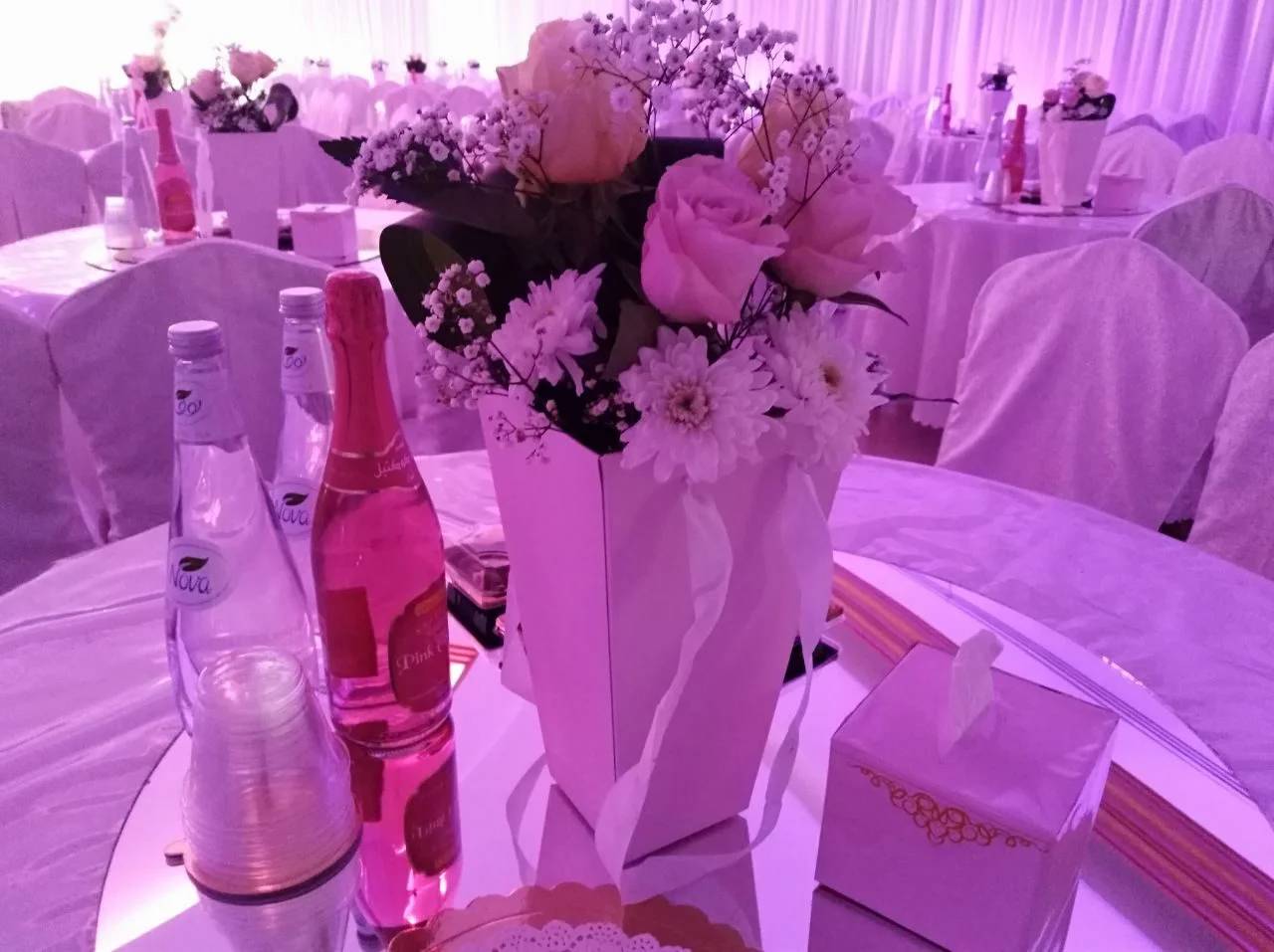 Elegant table setting with flowers at Sadeem Celebrations Hall Abha, Saudi Arabia.