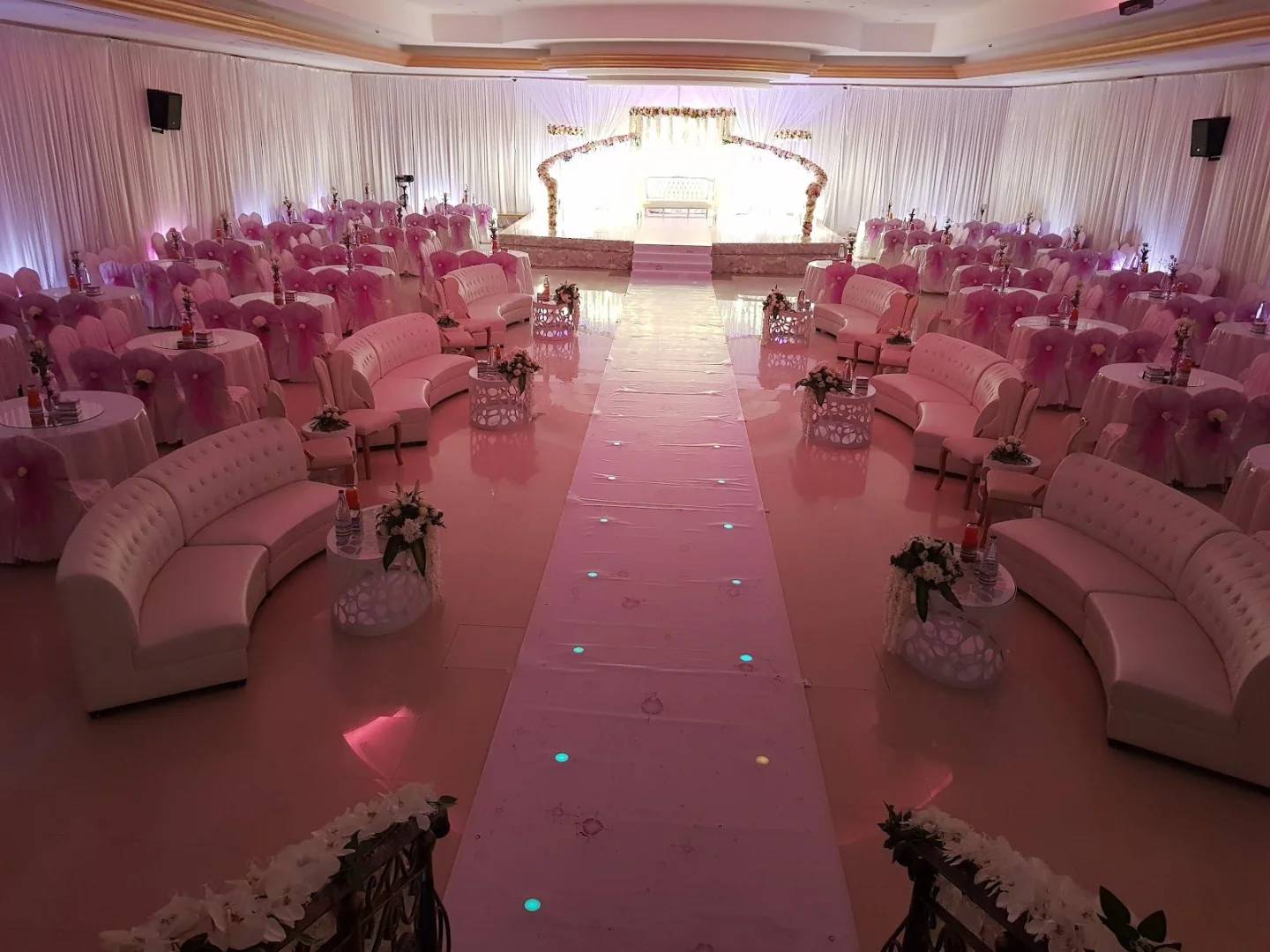 Elegant event setup with pink decor at Sadeem Celebrations Hall Abha, Saudi Arabia.