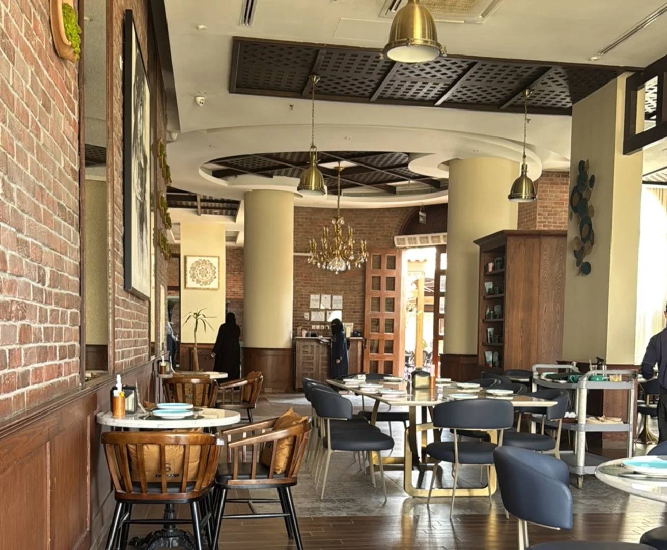 Elegant dining area with chandeliers at Soul Restaurant Al Bahah, Al Bahah, Saudi Arabia.