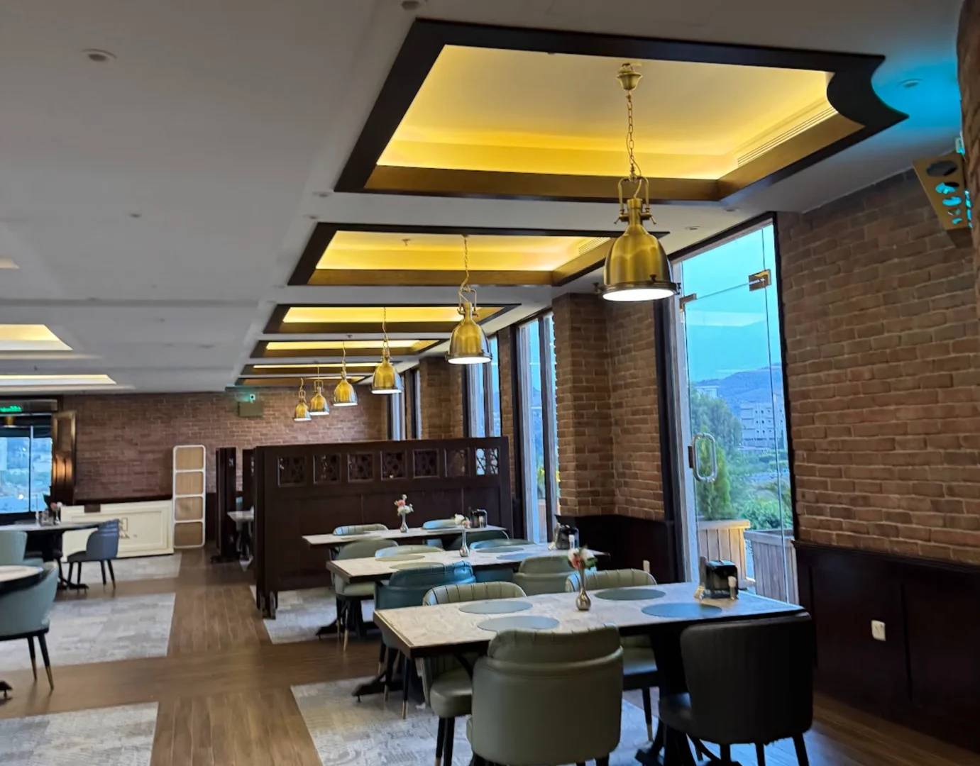 Elegant dining area with modern lighting at Soul Restaurant Al Bahah, Al Bahah, Saudi Arabia