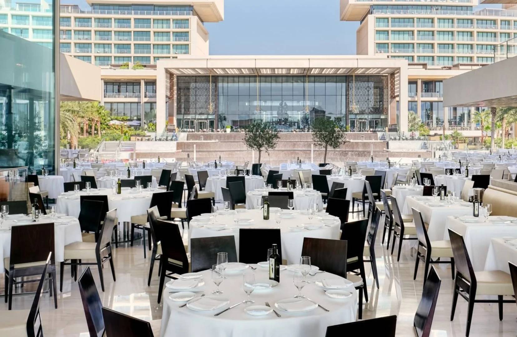 Elegant outdoor dining setup at Estiatorio Milos Dubai, Dubai, UAE