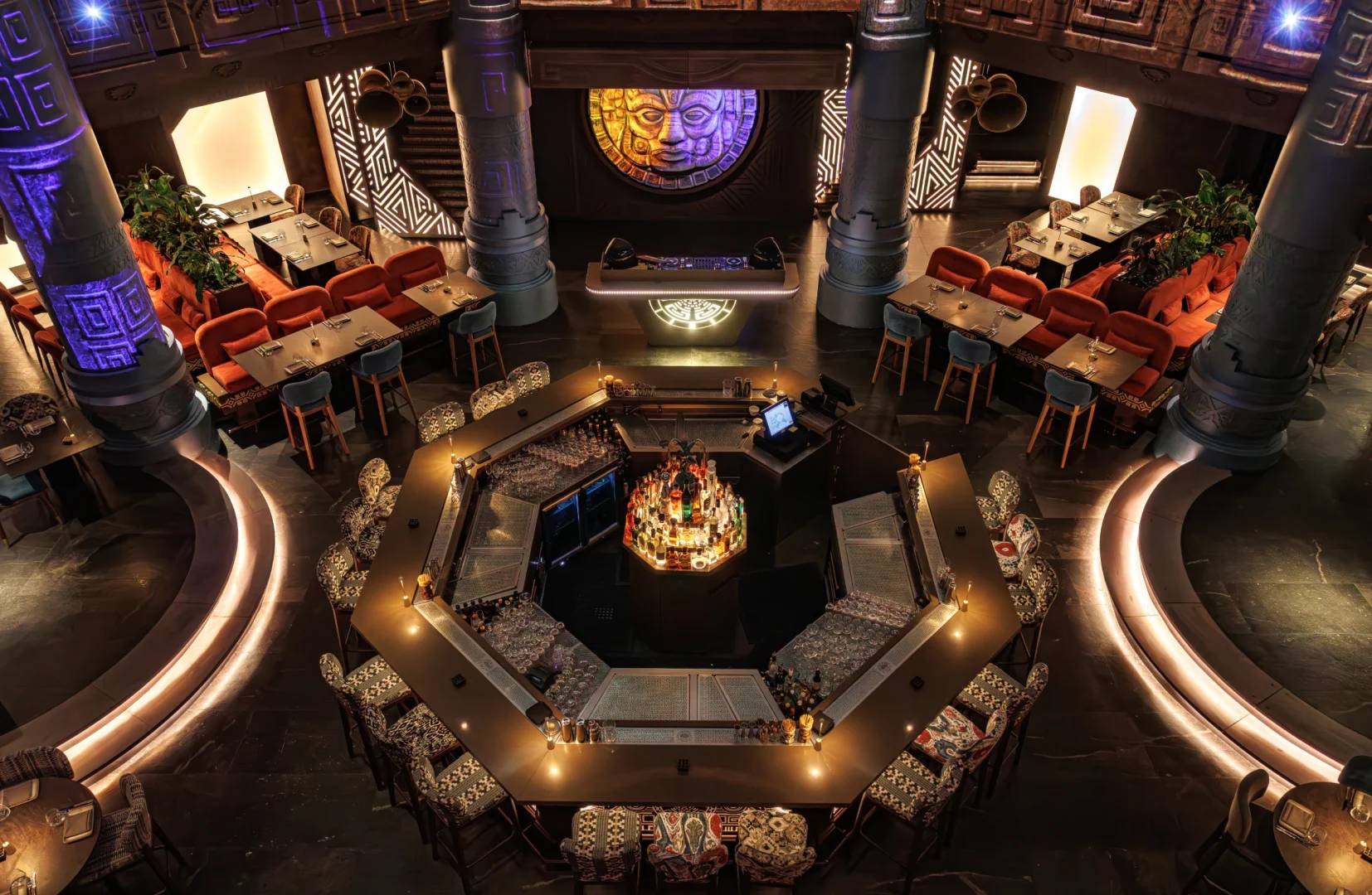 Elegant interior with central bar and seating at AMARU Dubai, Dubai, UAE