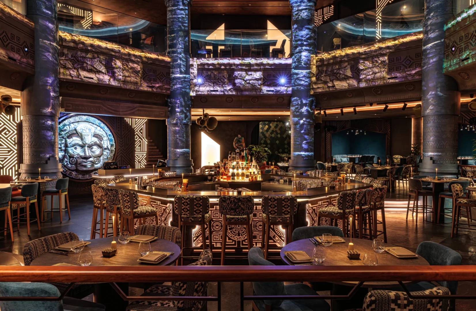Luxurious interior with ornate columns and seating at AMARU Dubai, Dubai, UAE