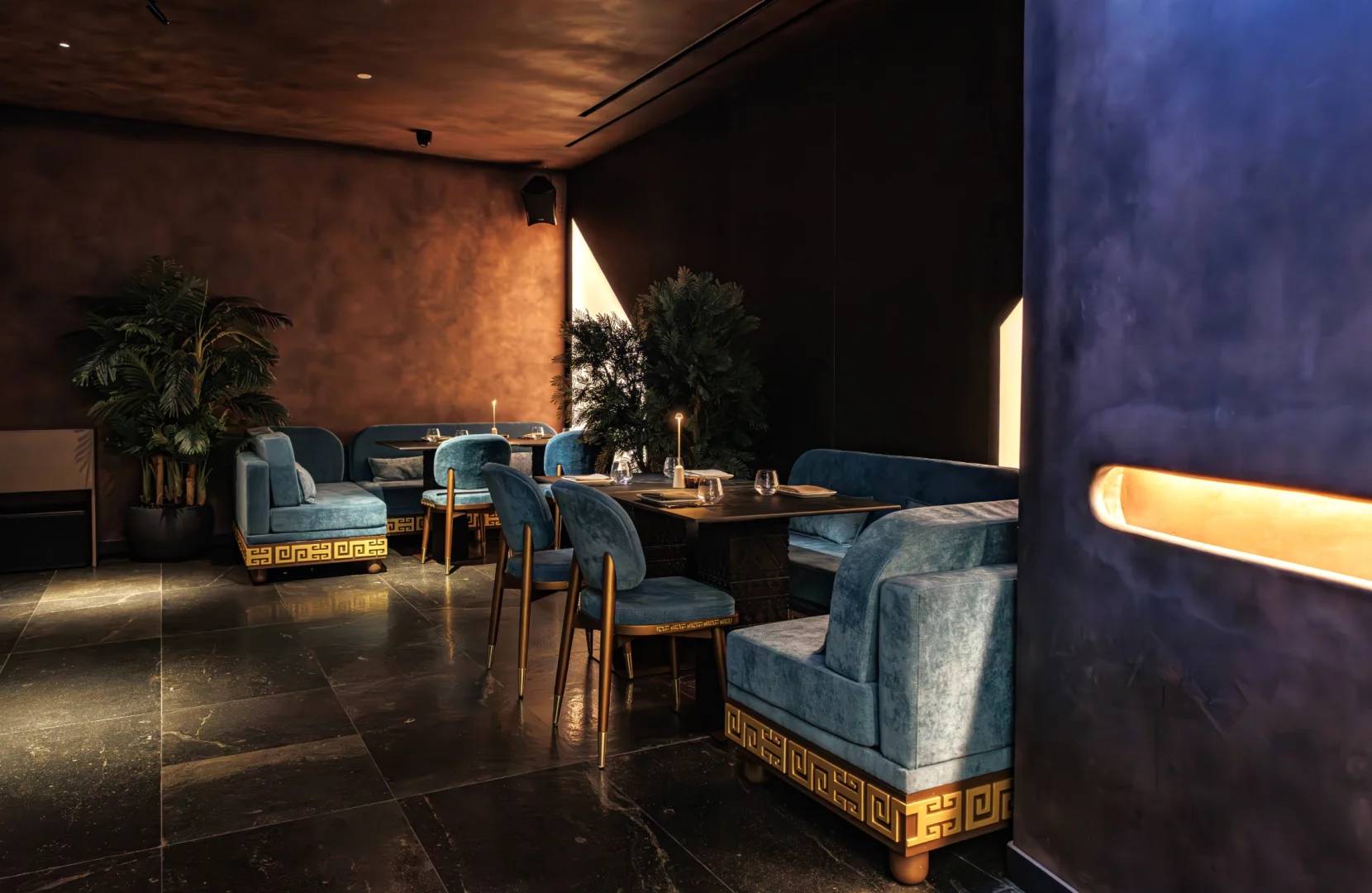 Elegant seating area with blue sofas at AMARU Dubai, Dubai, UAE