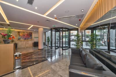 Hotel Boursier 1 & Spa - a lobby with a couch in a building at Hotel Boursier 1 &amp; Spa in Istanbul