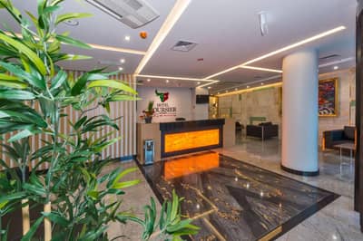 Hotel Boursier 1 & Spa - an office lobby with a large aquarium in the middle at Hotel Boursier 1 &amp; Spa in Istanbul