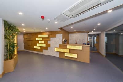 Hotel Boursier 1 & Spa - an office with a lobby with a reception desk and a wall at Hotel Boursier 1 &amp; Spa in Istanbul