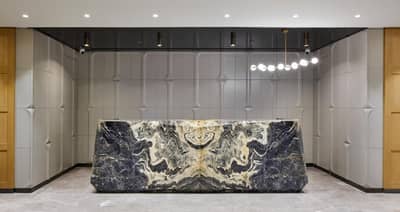 Lamartine Hotel - a lobby with a marble table in the middle at Lamartine Hotel in Istanbul