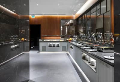 Lamartine Hotel - a kitchen with a counter with dishes on it at Lamartine Hotel in Istanbul