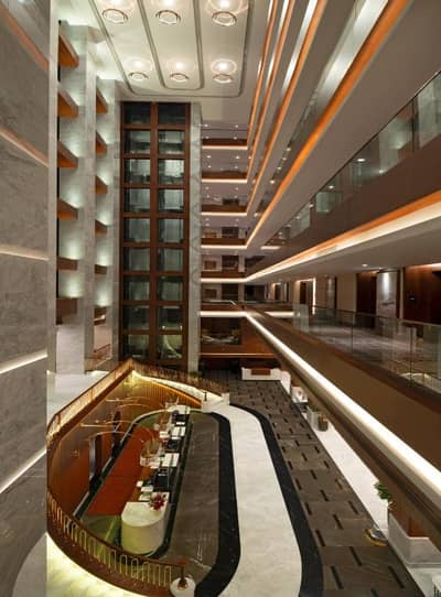 Mövenpick Hotel Istanbul Asia Airport - a lobby of a hotel with aasteryasteryasteryasteryasteryasteryasteryasteryastery at Mövenpick Hotel Istanbul Asia Airport in Istanbul