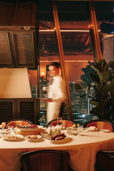 Elegant dining setup at Lion in the Sun Dubai venue.
