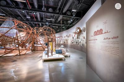 House of Artisans exhibition space with intricate wooden structures, Dubai.
