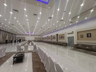 Elegant event space with seating and decor at Venice Wedding Hall Najran, Saudi Arabia