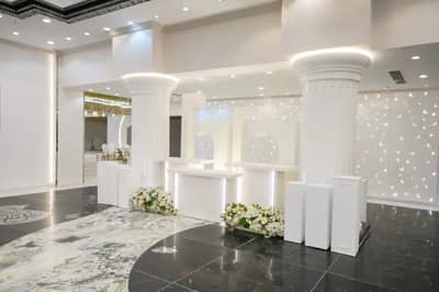 Elegant interior with columns and floral decor at One Thousand and One Nights Wedding Hall Madinah, Madinah, Saudi Arabia