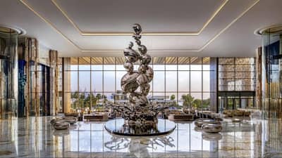 Luxurious lobby with sculpture at Atlantis The Royal, Dubai.