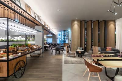 Modern lounge and dining area at Zabeel House The Greens, Dubai.