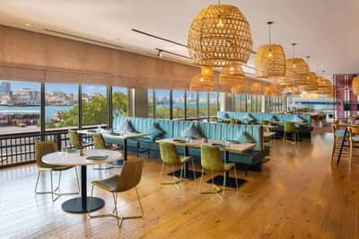 Spacious dining area at Radisson Blu Hotel, Dubai Deira Creek.