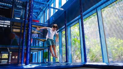 Child playing in indoor playground, Jumeirah Beach Hotel, Dubai.