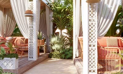 Maison de La Plage Dubai outdoor seating with tropical decor