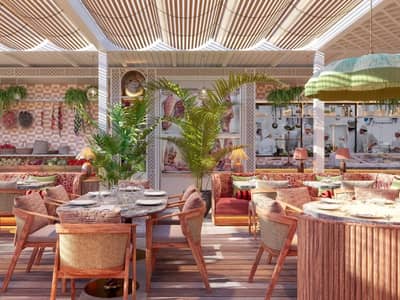 Maison de La Plage Dubai, elegant dining area with tropical decor.