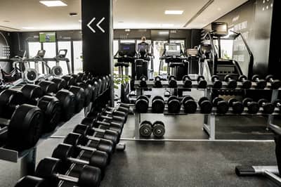Gym with weights and treadmills, Dubai Creek Golf & Yacht Club.