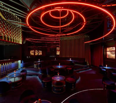Amelia Restaurant & Lounge in Dubai with modern red lighting design.