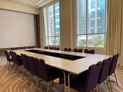 Conference room with tables and chairs, Khalidia Palace Hotel Dubai.