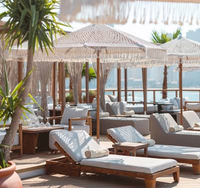 Luxurious cabanas at Be Beach DXB, Dubai, with ocean view.