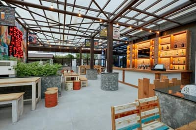Citymax Hotel Business Bay bar area with seating, Dubai.