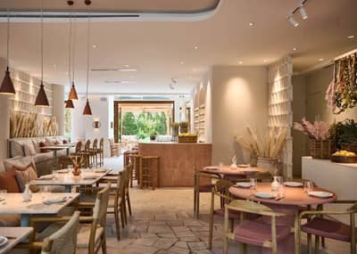 Mythos Urban Greek Eatery interior with rustic decor, Dubai.