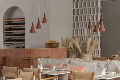 Cozy interior of Mythos Urban Greek Eatery in Dubai.