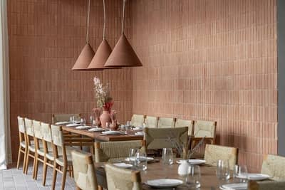 Cozy dining area at Mythos Urban Greek Eatery, Dubai.