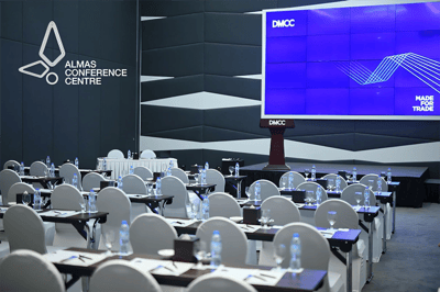 Almas Conference Centre auditorium setup with chairs and tables, Dubai.