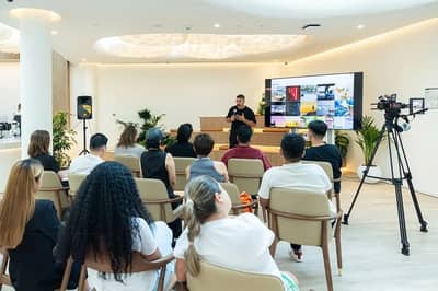 Speaker presenting to audience at Cloud Spaces Circle Mall Dubai.