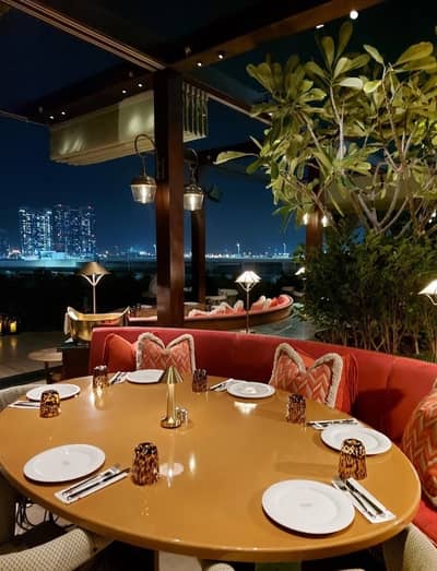 Elegant outdoor dining at Flamingo Room by tashas, Abu Dhabi.