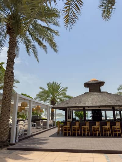 Outdoor bar and seating at Cabana On The Beach, Dubai.