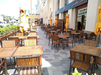 Outdoor seating at Al Bait Al Shami Restaurant, Dubai.
