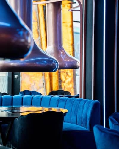 Luxurious blue seating at KUKU Restaurant and Lounge, Dubai Al Wasl.