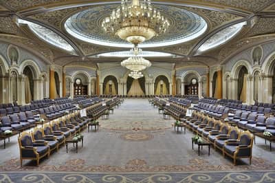 Luxurious ballroom with chandeliers at The Ritz Carlton Riyadh.