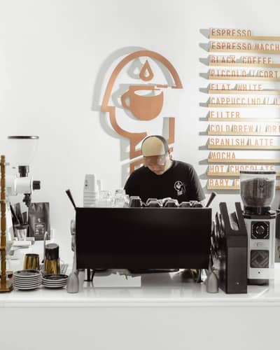 Barista working at Fiks Coffee Umm Suqeim, Dubai.