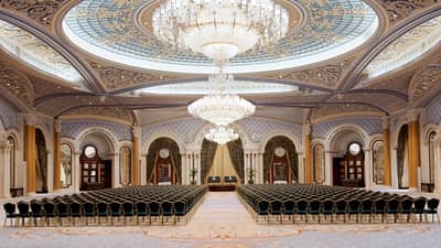 Elegant ballroom with chandeliers at The Ritz Carlton Riyadh.