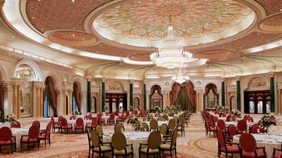 Ornate ballroom with floral decor at The Ritz Carlton Riyadh.