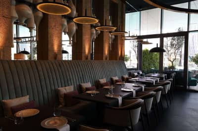 Elegant dining area at Babel Dubai Restaurant Downtown, with modern decor.
